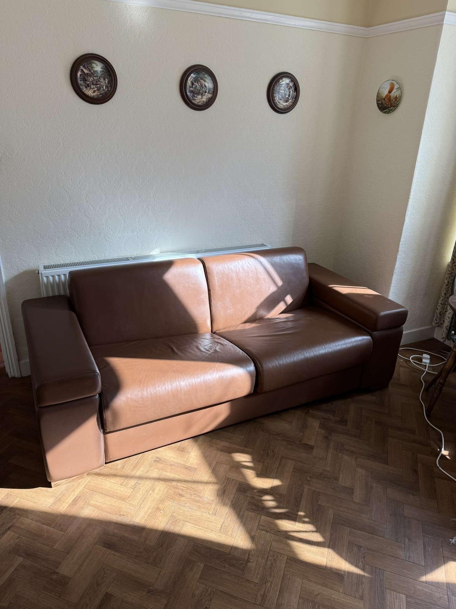 brown sofa ready for collection