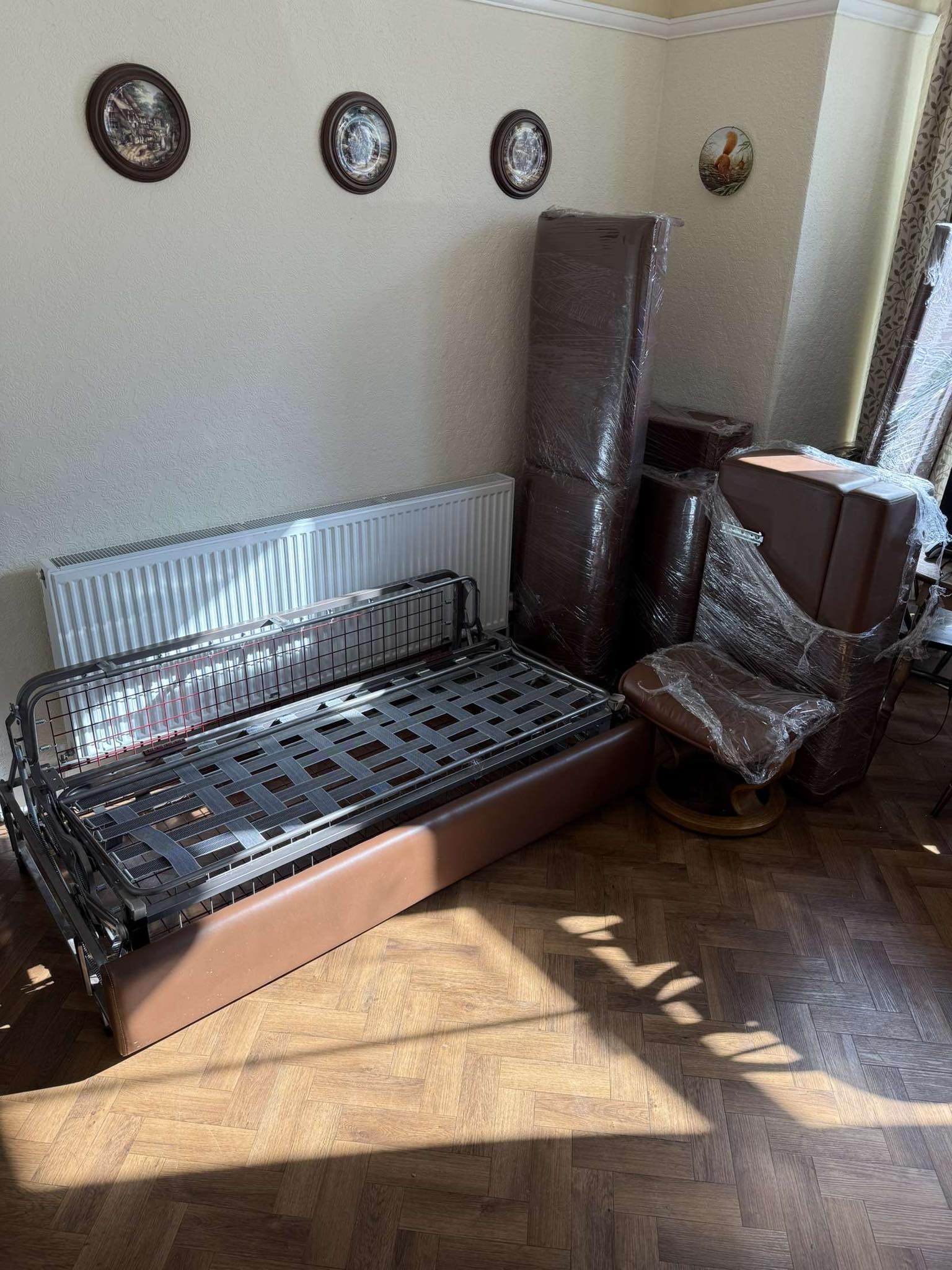 Brown sofa dismantled ready for collection
