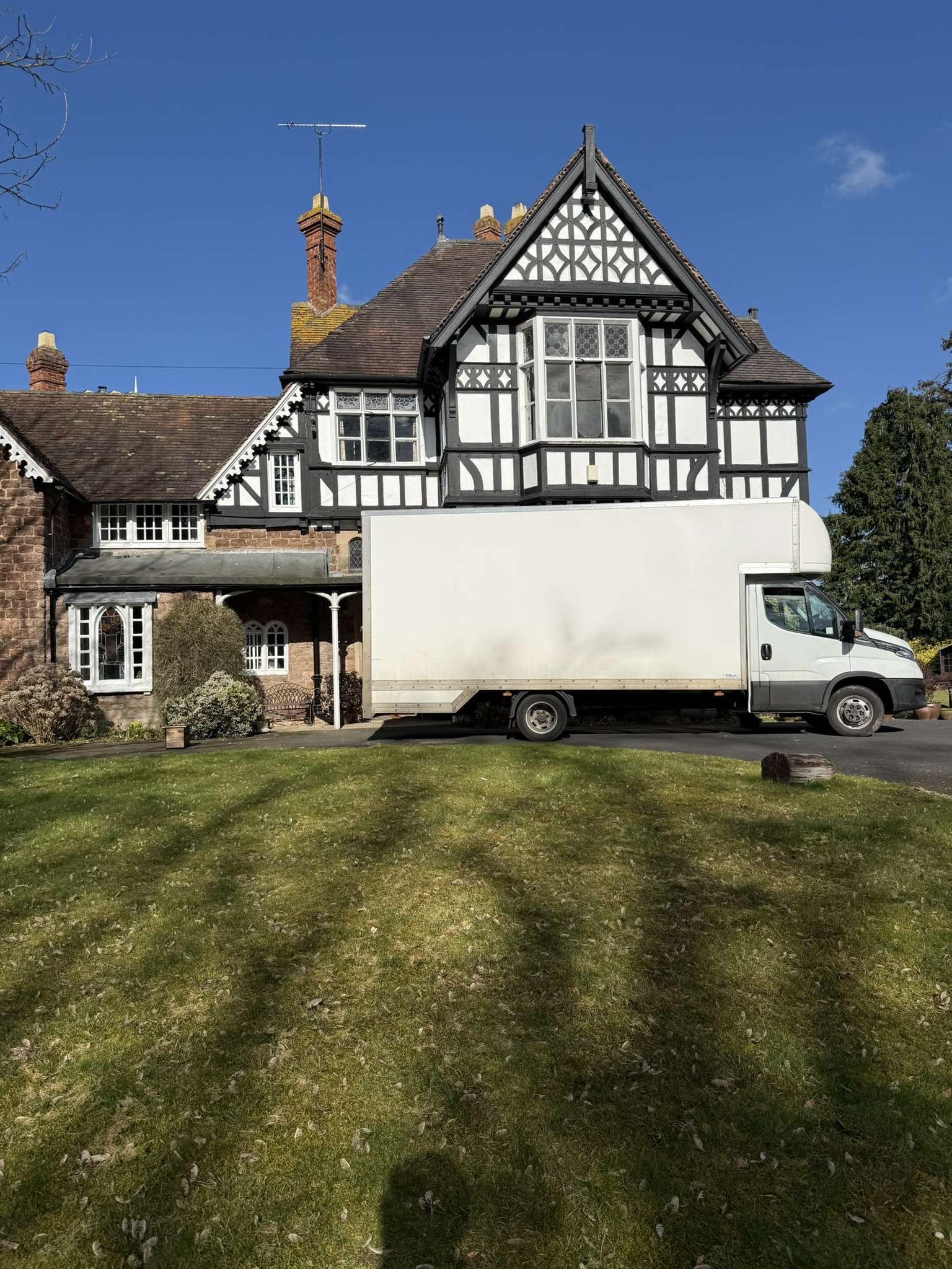 Removal van outside a house