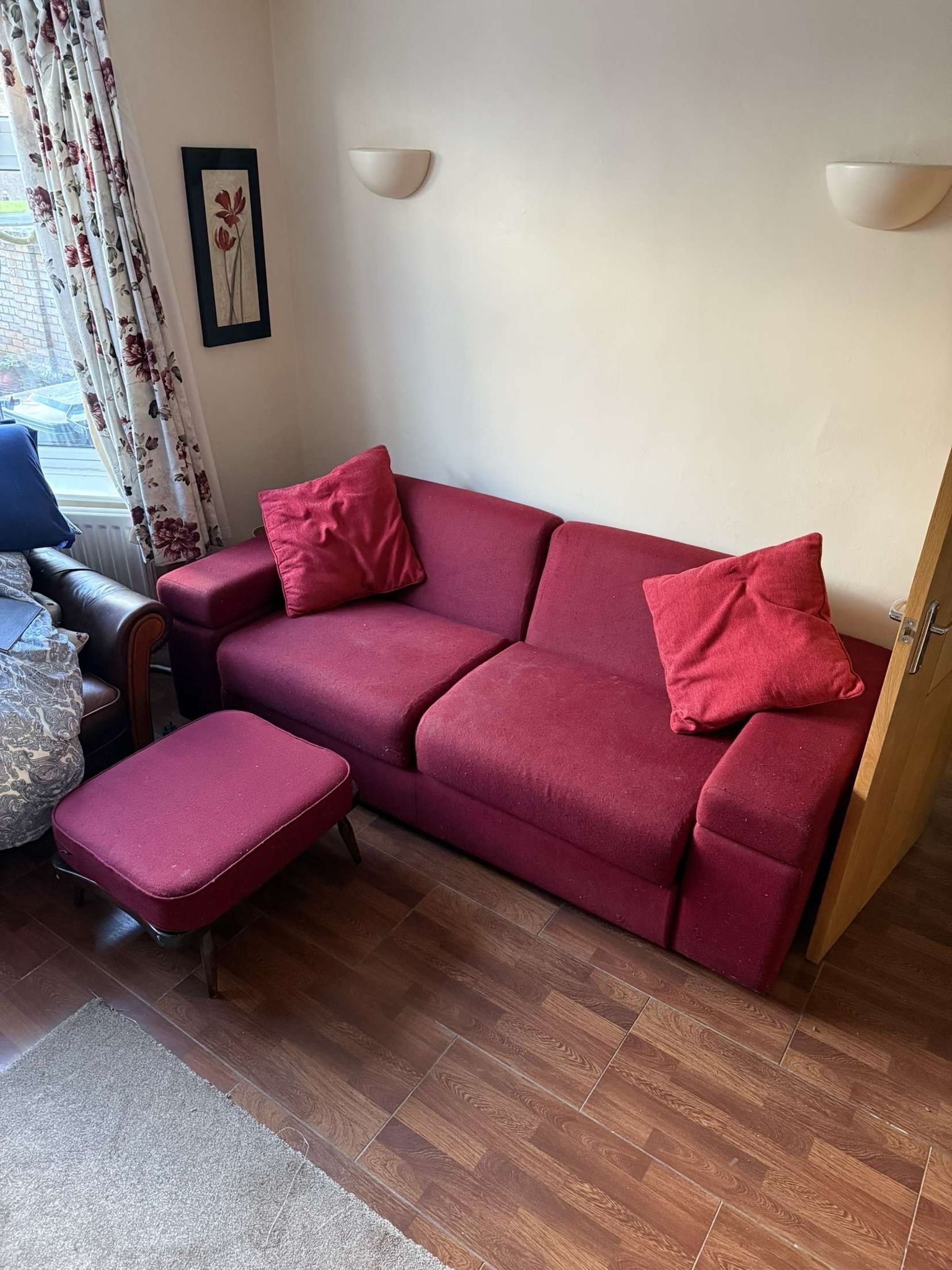 red sofa before removal